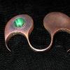 Copper and silver hollow construction with malachite bezel set cabachon
